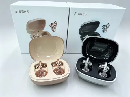 Gold and silver diamond-encruted in-ear Bluetooth noise-cancelling wireless headphones owsx5s offer a fashionable headphone experience Gold and silver diamond-encruted in-ear Bluetooth noise-cancelling wireless headphones owsx5s offer a fashionable headphone experience